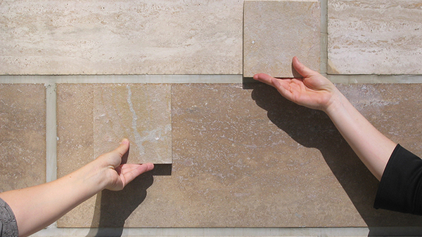 hands in front of a wall